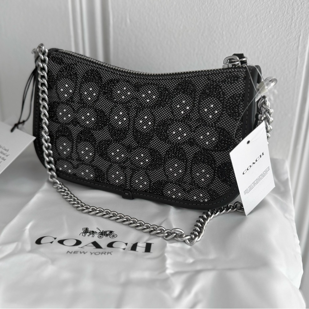Coach crystal swinger in black NWT